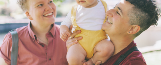 A queer couple with a baby used to illustrate sexuality concerns in counselling.